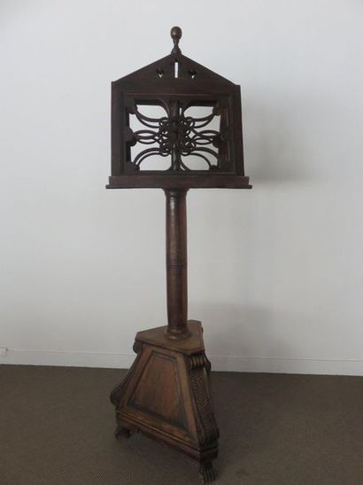 Moulded and carved oak church lectern on...