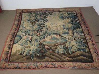 Woollen tapestry: in the foreground birds...