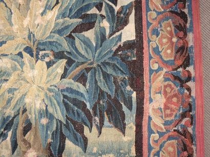 Woollen tapestry: in the foreground birds...
