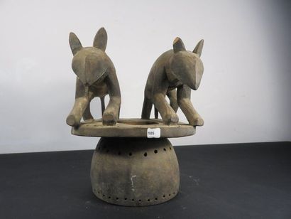 COIFFE surmounted by two animals, hyenas?...