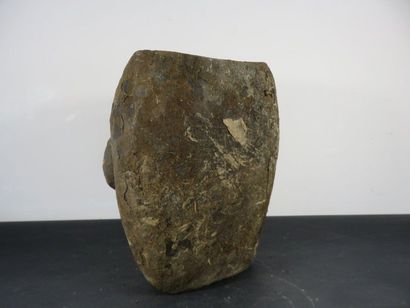DRUM. Wood with a crusty patina, carved in...