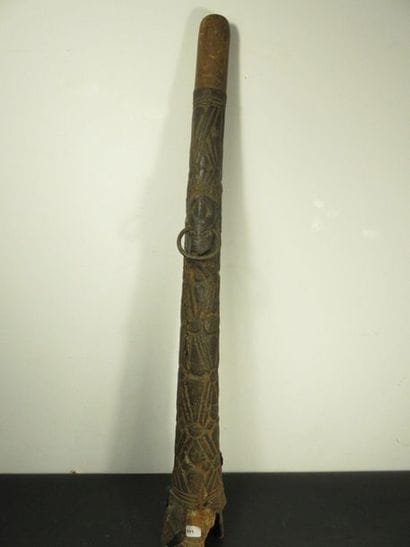 HORN. Wood and skin patinated by use, carved...