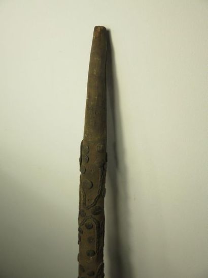 HOSE of a big pipe. Wood and metal. It is...