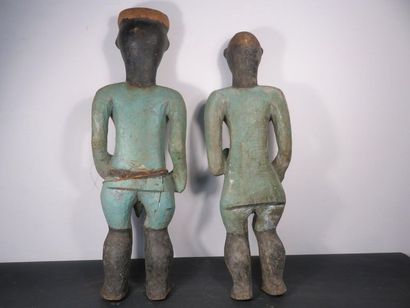 COUPLE OF STATUES. Wood painted green for...