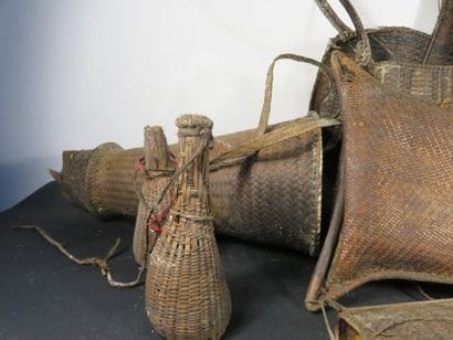 LOT OF FIVE ARROW HOLDERS made of woven basketry,...