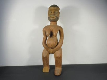 Female STATUS. Heavy wood. Missing the right...