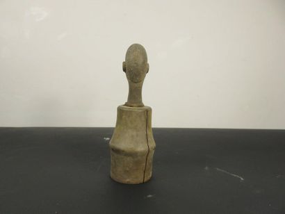Wooden box with handle carved with a human...