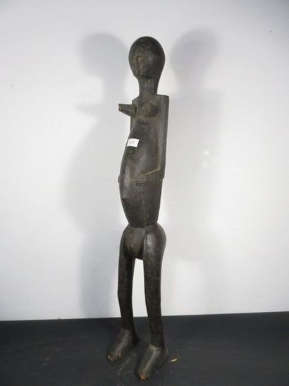 FEMALE STATUETTE. Blackened wood. Various...