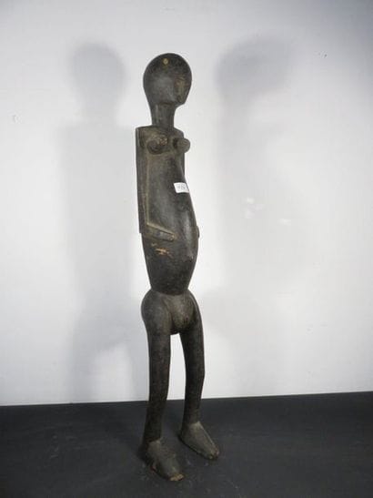 FEMALE STATUETTE. Blackened wood. Various...