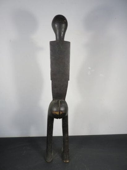 FEMALE STATUETTE. Blackened wood. Various...