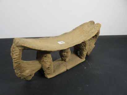 NECKREST carved with an animal at each end....