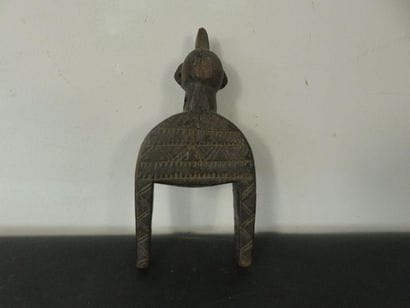 WEAVING PULLEY: Bird's head. Wooden engraved...