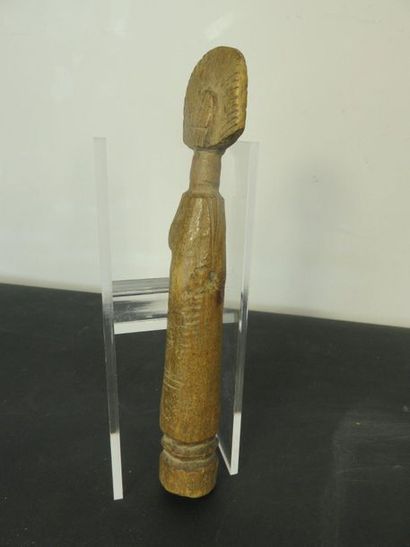 TWO DOLLS. Patinated wood, small engraved...
