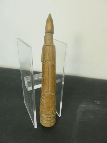 TWO DOLLS. Patinated wood, small engraved...