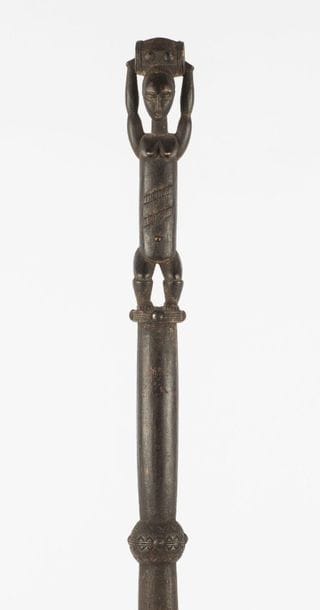 CANNE. Wood, brown patina. Iron point. The...