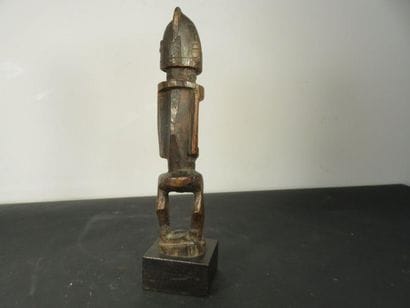 Male fetish represented standing, arms glued...