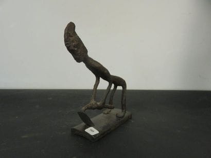 CHARACTER represented digging. Wrought iron....