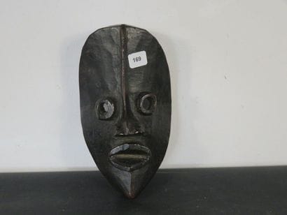 FACIAL MASK. Hard wood, beautiful shiny black...