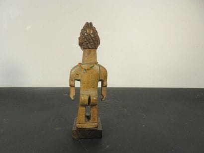 Female STATUS. Wood, light patina. Necklace...