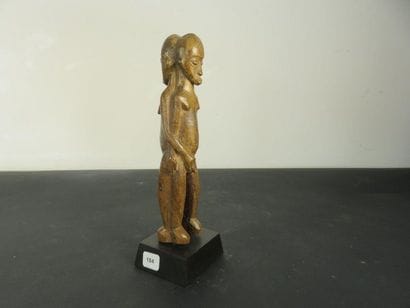 STATUETTE Janus. Wood, beautiful light patina....