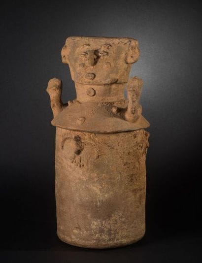 ANTHROPOMORPHIC URN. Terracotta coated earthenware....