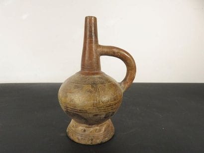 BOTTLE with handle on pedestal. Ceramic with...