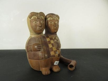 VASE representing a couple sitting side by...