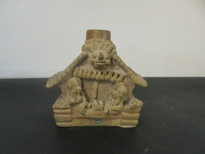 VASE house and its two occupants in front...