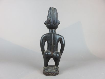 COUPLE de STATUETTES Ibedji. Bois, à belle...