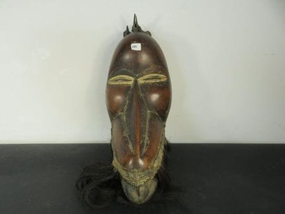 MASK. Carved wood and horsehair. Ivory Coast,...