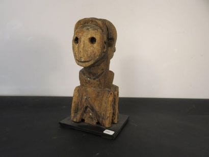 JANIFORM SCULPTURE, depicting a bust with...