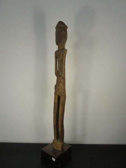 STATUS of a slender CHARACTER with crossed...