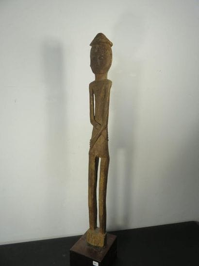 STATUS of a slender CHARACTER with crossed...