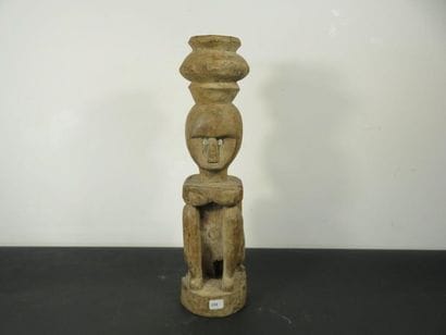 MALE STATUS HIGH, arms folded. Heavy wood,...