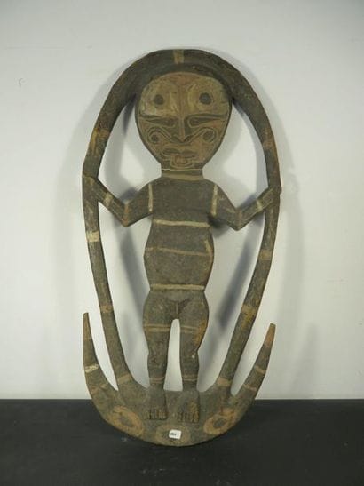Wooden HANGER with a figure inscribed in...