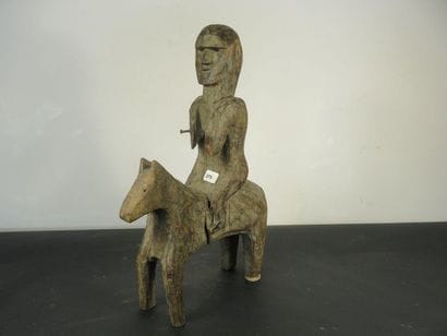 STATUS OF A MALE ON HORSE. White mineral...
