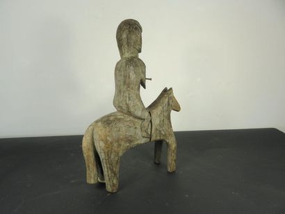 STATUS OF A MALE ON HORSE. White mineral...