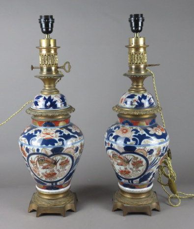 Paire de lampes à pétrole en porcelaine à...
