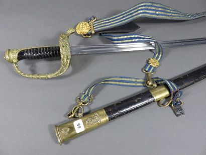 Sabre d’officier de marine. Poignée vernie....