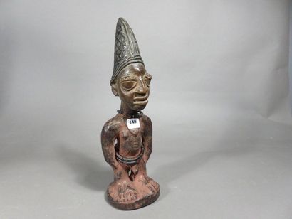 Ibedji. Statuette masculine. Le corps est...