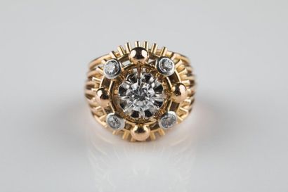 Bague en or jaune et platine, corps multifils...