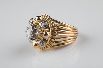 Bague en or jaune et platine, corps multifils...
