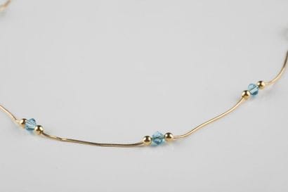 Collier maille serpentin en or jaune, rythmé...