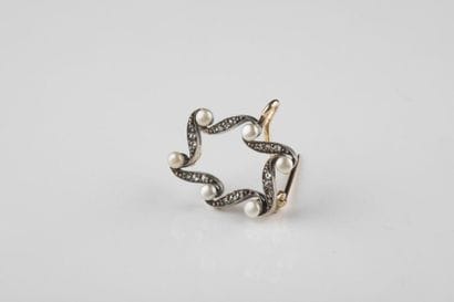 Broche en argent et or jaune au décor de...