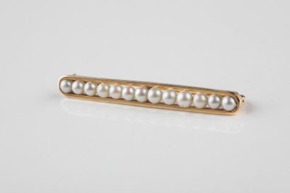 Broche barrette en or jaune ornée en son...