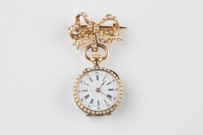 Très jolie montre pendentif en or 750 millièmes,...