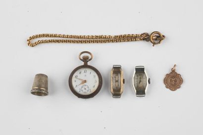 Lot de trois montres de dame, une médaille,...