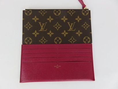 Louis VUITTON

Porte-carte fuchsia et pochette...