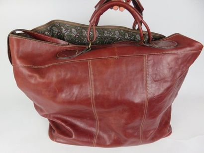 Sac de voyage en cuir vieilli bordeaux

(état...
