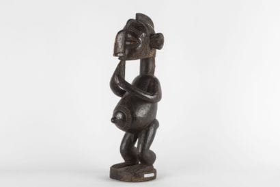 Male statue representing a B'mba (nimba)...